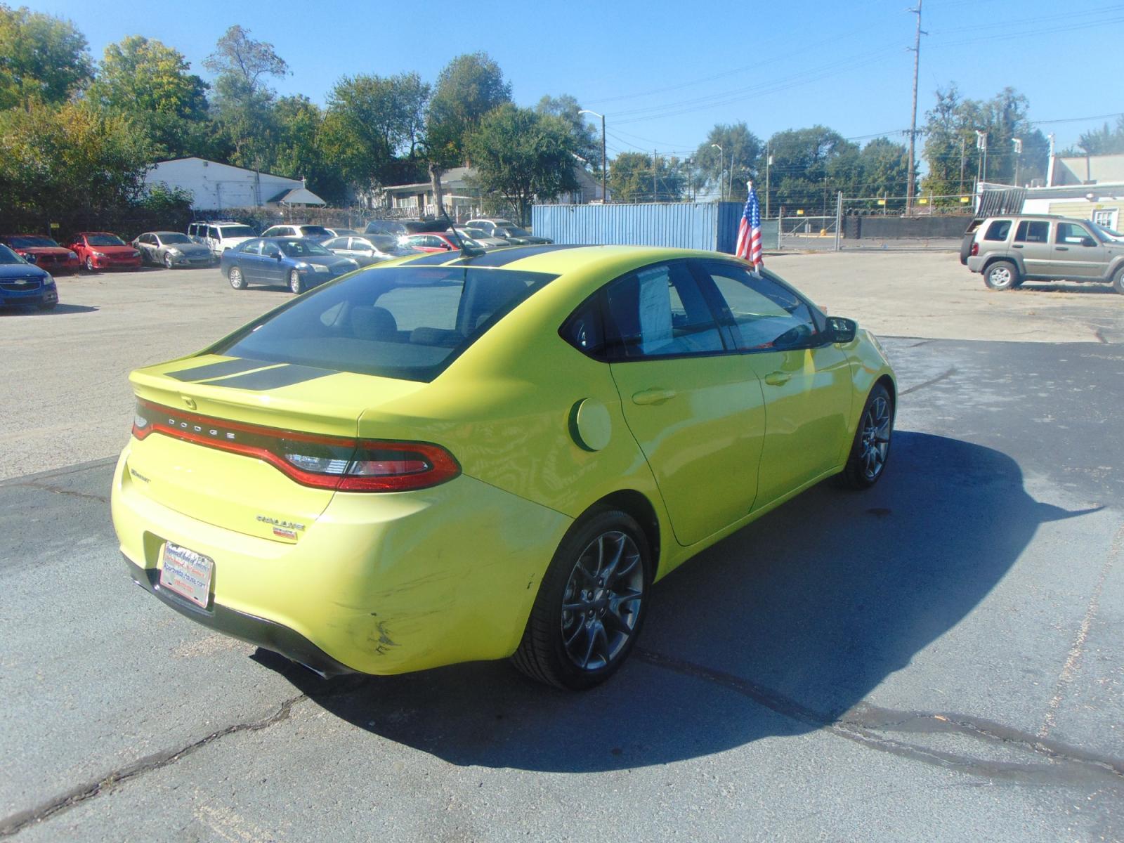 2013 Yellow Dodge Dart (1C3CDFBHXDD) with an 4-CYL Tigershark 2.0L engine, Manual, 6-Spd transmission, located at 2105 Dixie Hwy, Louisville, KY, 40210, (502) 772-3333, 38.221058, -85.792671 - Photo #6